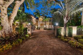 entrance of 2501 Barcelona Drive at night | Luxury Real Estate In South Florida | Florida Luxurious Properties